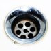 Detailed image of a chrome sink drain showcasing water droplets and a metallic finish.